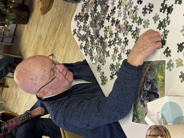 Senior working on a puzzle
