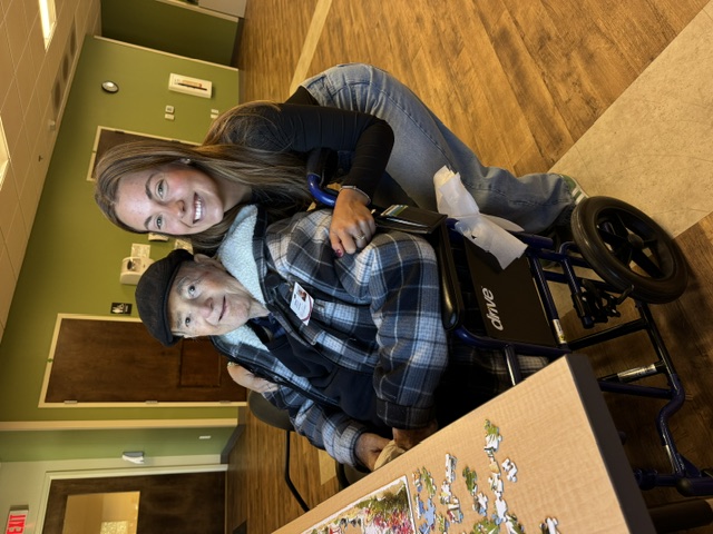 Lauren with a client, smiling together